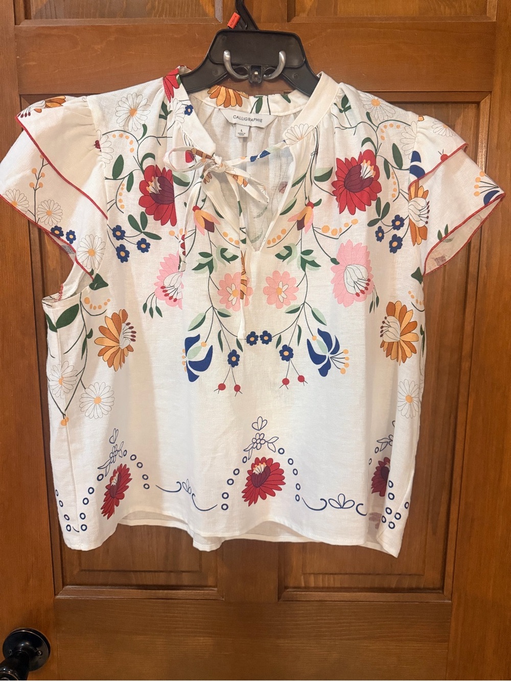 Casual Floral Tie-Neck Blouse in White with Multicolor Blooms